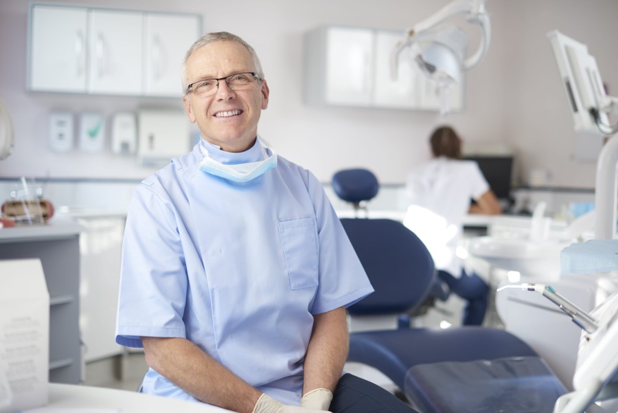 mature male dentist portrait